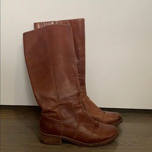 Tall brown leather boots
